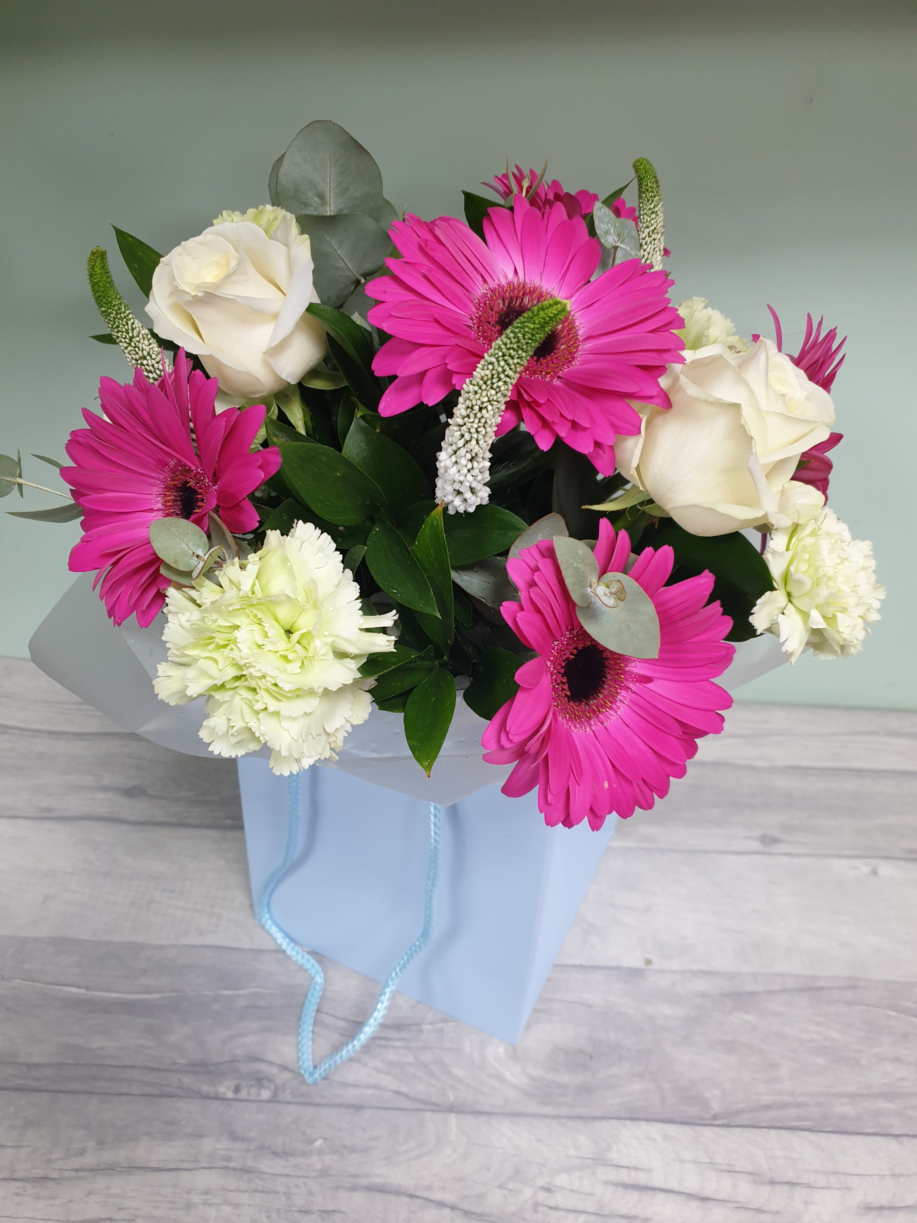 Daydream aqua packed floral arrangement