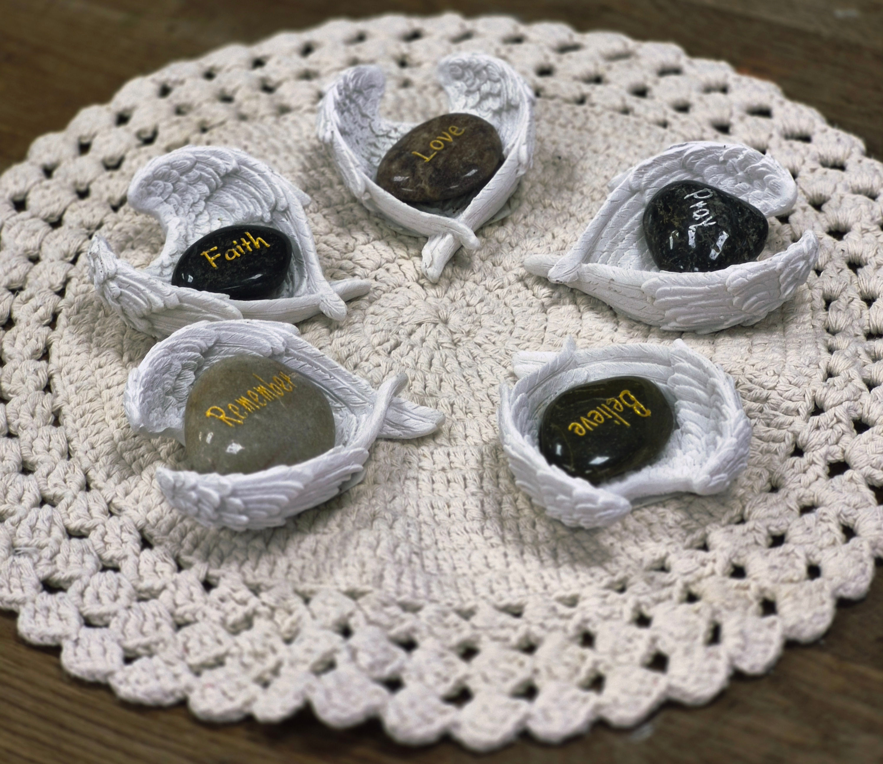 Angel wings trinket with a stone token
