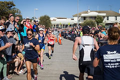 Runners on the Barwon Heads bridge at an earlier triathlon