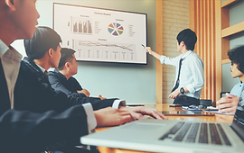 business-people-presentation-on-future-plans-to-colleagues-business-meeting-concept.png