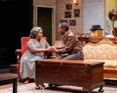 Marlette Buchanan and Arlando Smith in A Raisin in the Sun at Taproot Theatre. Photo by Robert Wade.