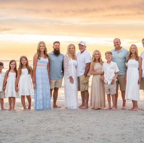 Beautiful family portrait with golden hour glow over the Gulf of Mexico on Marco Island by Joey Waves Photography