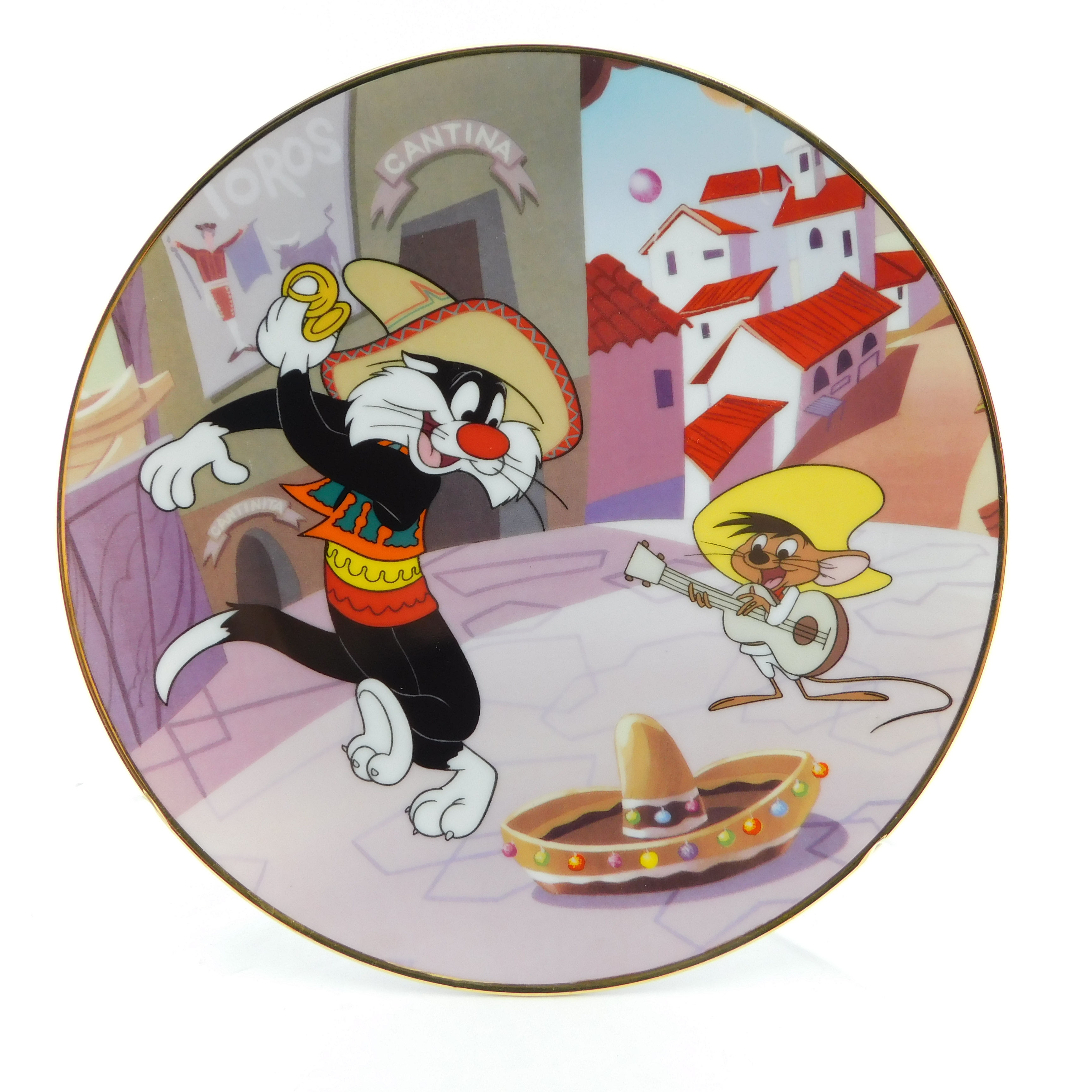 Sylvester cat and speedy Gonzales mouse dancing around a hat