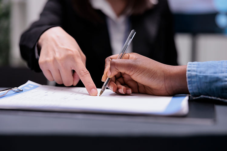 patient-filling-report-papers-reception-desk-signing-registration-forms-before-attending-c