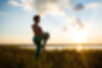 silhouette-sportive-girl-practicing-yoga-field-sunrise.jpg