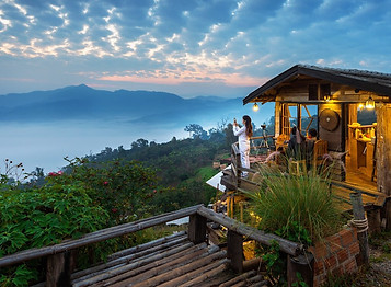 woman-taking-photo-morning-mist-phu-lang-ka-phayao-thailand_335224-950.jpg