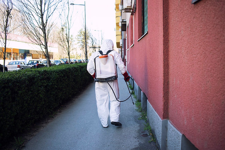worker-chemical-protection-suit-spraying-disinfectant-public-surfaces.jpg