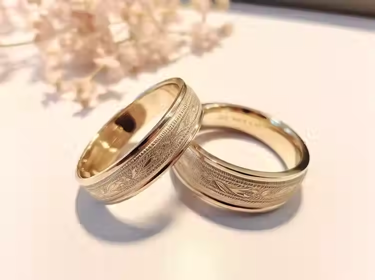 a pair of Lumière Band on a luxury surface