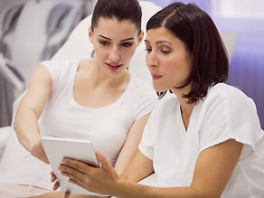 female-doctor-using-digital-tablet-consult-patient.jpg
