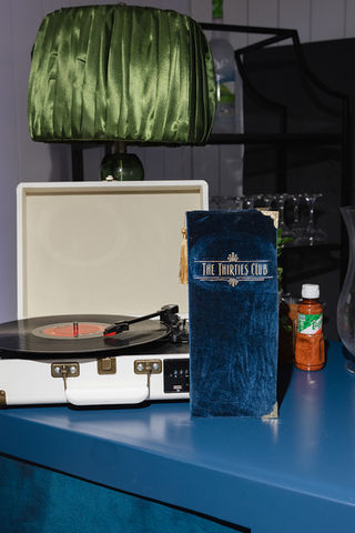 Vintage record player and personalized velvet guest book display at a luxury Hamptons private event designed by Blueprint Events Co. NY.
Hamptons Event Planner, Luxury Hamptons Private Events, Vintage Record Player Display, Custom Guest Book, Interactive Event Experiences, Luxury Event Styling, Bespoke Event Design, Speakeasy Party Theme, Luxury Birthday Party Ideas, Personalized Event Decor, High-End Private Celebrations, Hamptons Event Design, Luxury Guest Experience, Event Details, Blueprint Events Co. NY