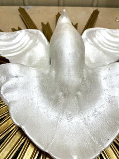 wooden dove sculpture