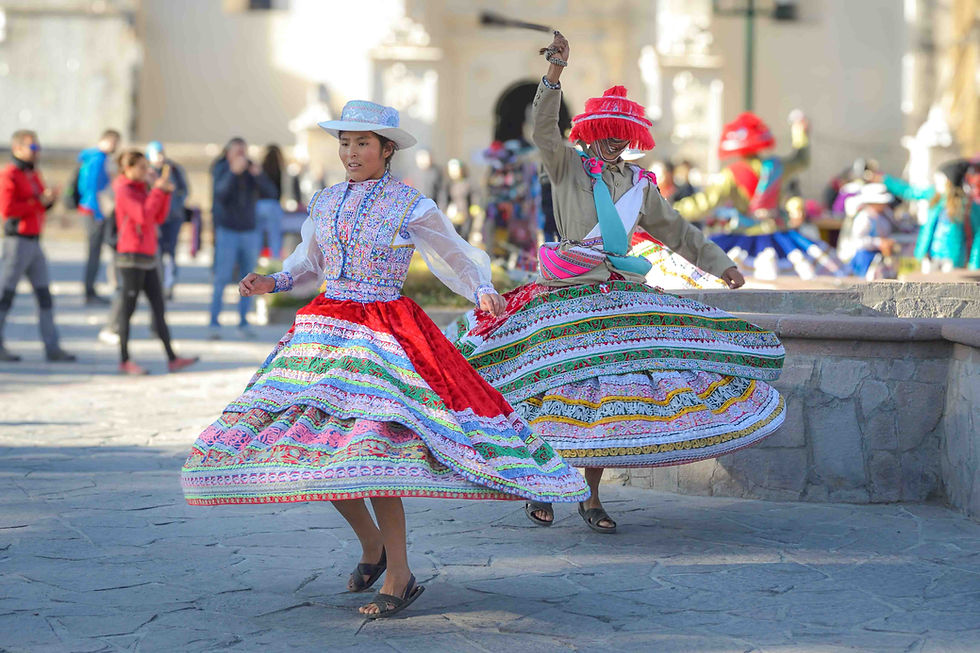 traditional dancers of Yanque in Peru's Colca Canyon wearing colorful embroidered traditional costumes