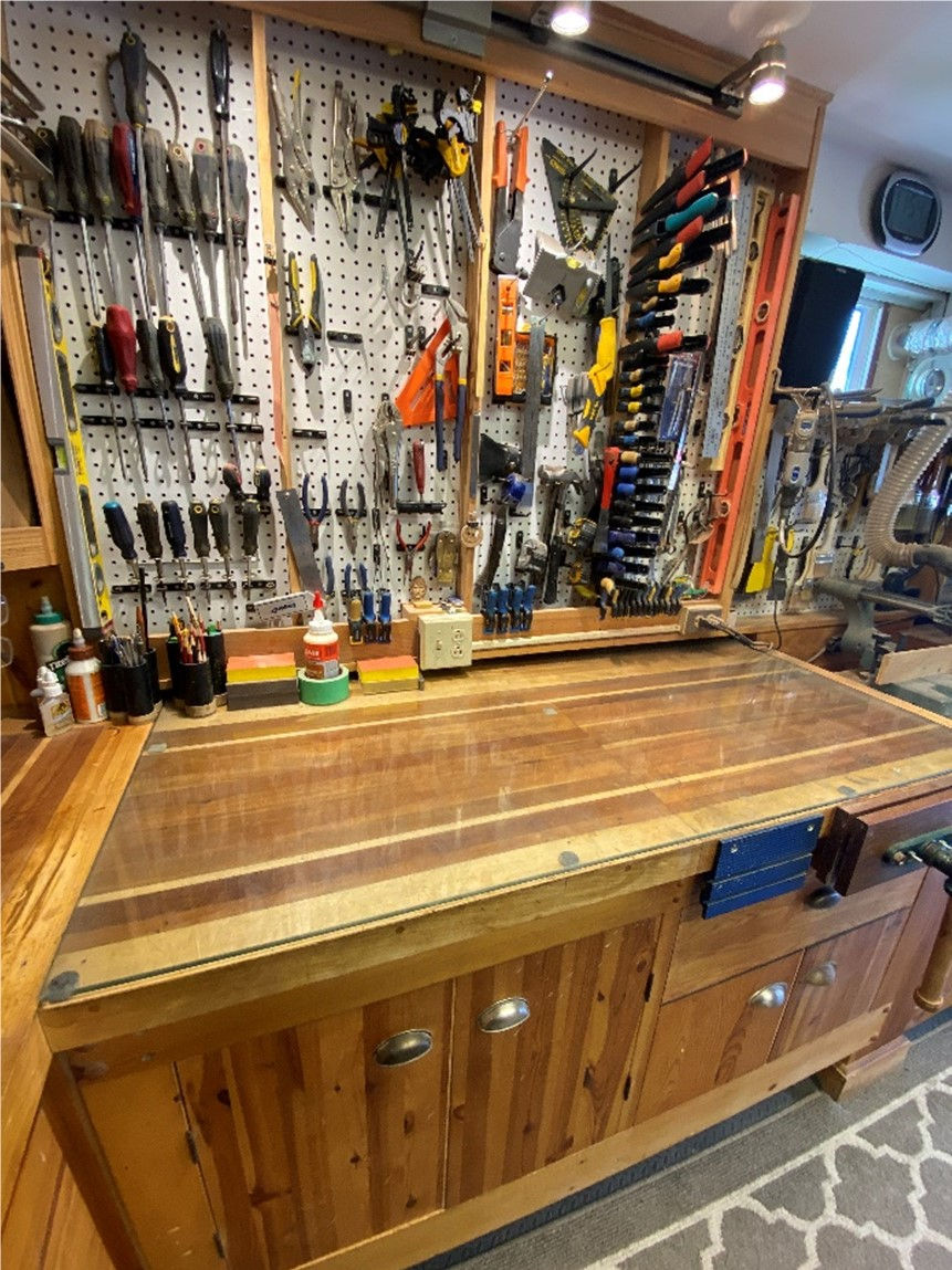 Scroll saw with overhead lamp and heater