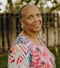 Lauretta Andrews  Assistant Director