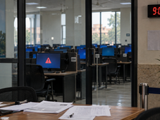 Technical glitches at two NEET-PG 2026 centres in Jaipur triggered protests after candidates alleged repeated computer shutdowns during the examination.(AI-Generated Image)
