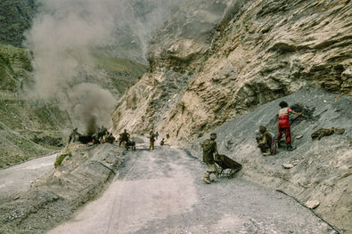 Road construction on the Manali-Leh road in the Lahaul region of Himachal Pradesh. India, 1994.