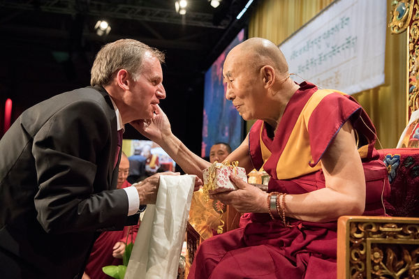 Philip Hepp, Managing Director of TIR, presenting His Holiness the Dalai Lama with a Swiss watch on behalf of the TIR foundation at the conclusion of Tibet Institute Rikon's 50th Anniversary Celebration in Winterthur, Switzerland on September 22, 2018. Photo by Manuel Bauer.