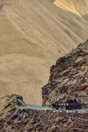 A truck transports sheep on the Xinjiang-Tibet road south of Kargilik. Xinjiang, 1987.