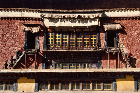 Pilgrims visit the main temple of the monastic complex Pelkhor Chode in Gyantse. Tibet, 1987.
