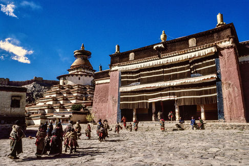 Pilgrims visit the main temple of the monastic complex Pelkhor Chode in Gyantse. Tibet, 1987.