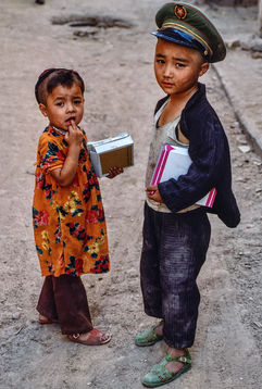Uyghur siblings in the streets of Kashgar. Xinjiang, 1987.