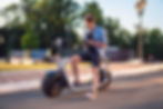 handsome-young-man-sitting-on-electric-bike-or-sco-2021-09-03-21-11-23-utc.jpg