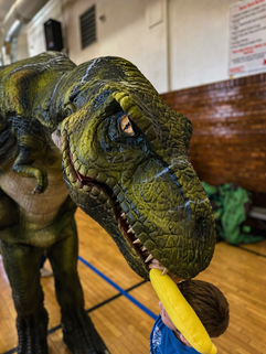 kids shocked by dinosaur entrance birthday Lake Zurich Illinois