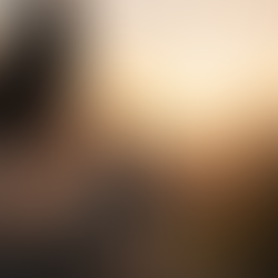 Woman sitting at sunrise reflecting on growth and staying steady during life transitions”