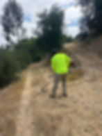 Crew performing hillside weed abatement and dry grass clearing