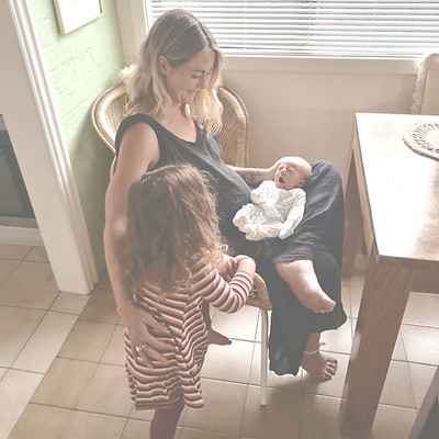 Mother looking lovingly at her two children
