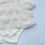 Thumbnail: Baby Girl Frill Onesie - White Girl