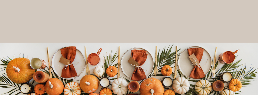A table setting with fall decorations