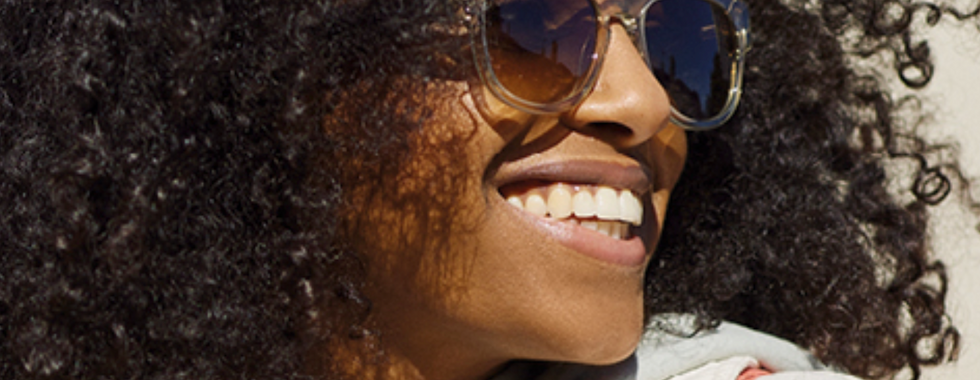 Woman with Fauna Audio Glasses
