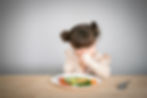 Little girl refusing to eat her vegetables. Credit shutterstock_726664804