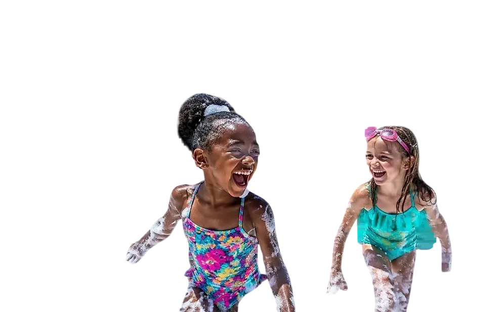 Outdoor photography of two diverse young girls joyfully playing and laughing, covered in white foam. The image captures a moment of pure, energetic summer fun.