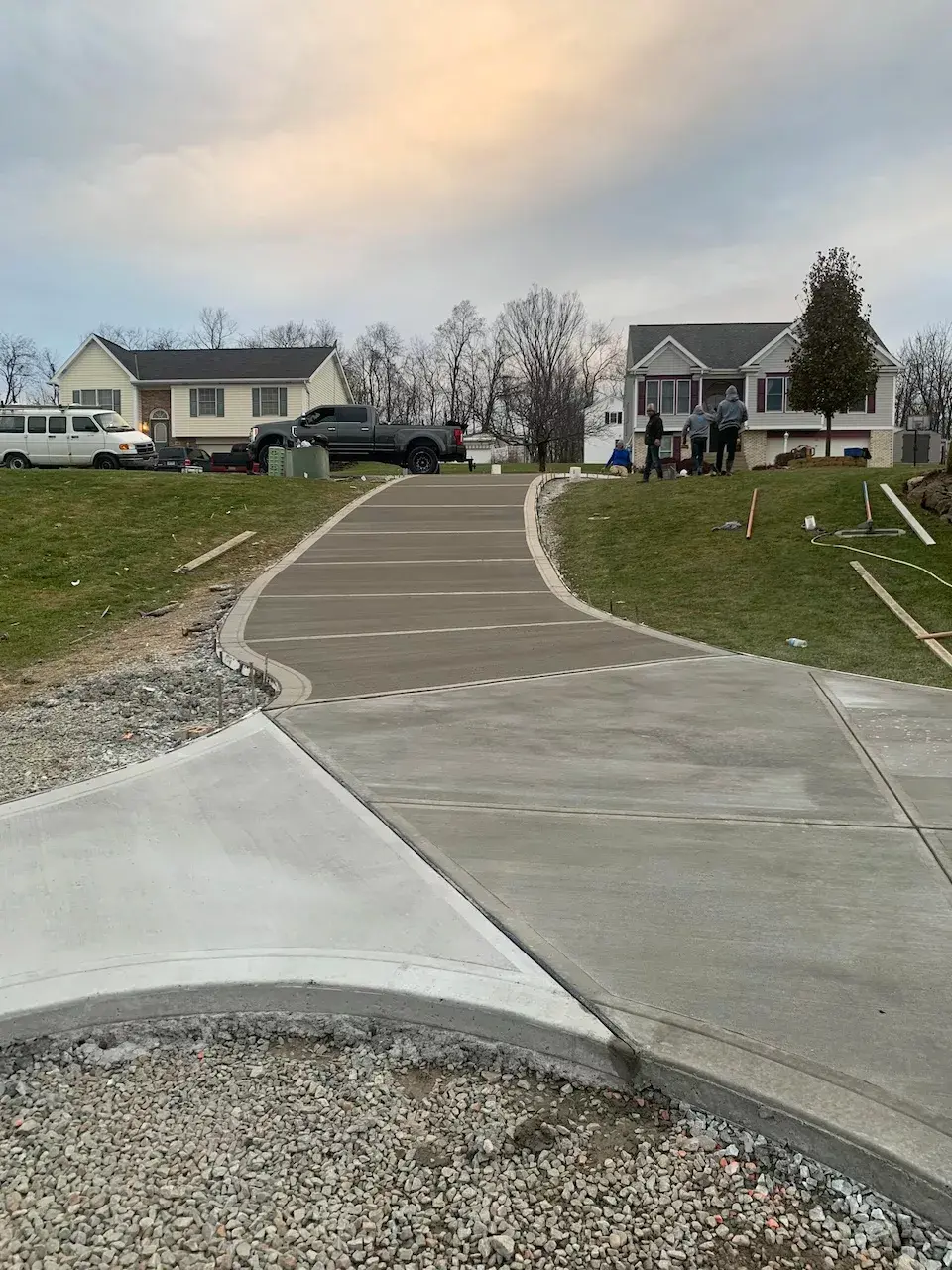Beautiful exposed aggregate concrete patio installation in Pittsburgh showing natural stone aggregate finish
