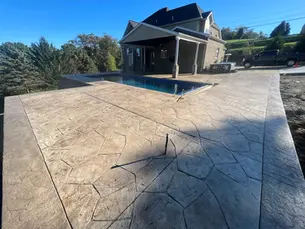 Concrete patio maintenance Pittsburgh freeze thaw protection with professional sealing application