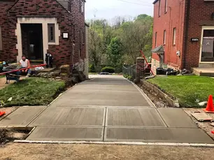 brk custom concrete, concrete driveway, pools, retaining walls, outdoor living spaces,