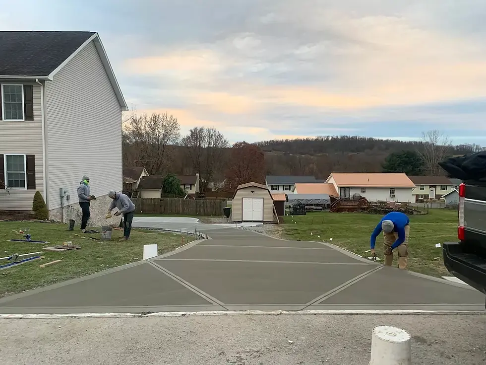 Professional concrete driveway installation in Pittsburgh showcasing expert craftsmanship and modern design