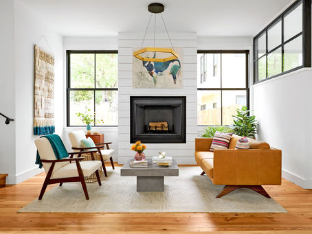A Farmhouse-style living room with flooring from Liquidation Land Discount Flooring
