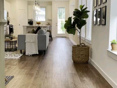 This is an image of the inside of a home with Luxury Vinyl Plank flooring from Liquidation Land Discount Flooring.