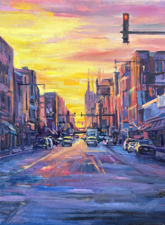 Painting of city at sunset