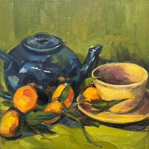 Still life of tea pot and oranges