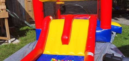 Bouncy castle with slide and ball pit
