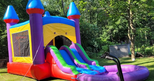 Colorful castle bounce house combo with slides