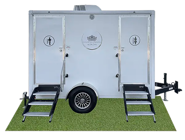 Two-stall restroom trailer with separate entrance doors and steps