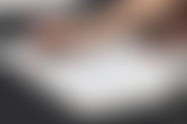 A student draws an image of Donald Duck.