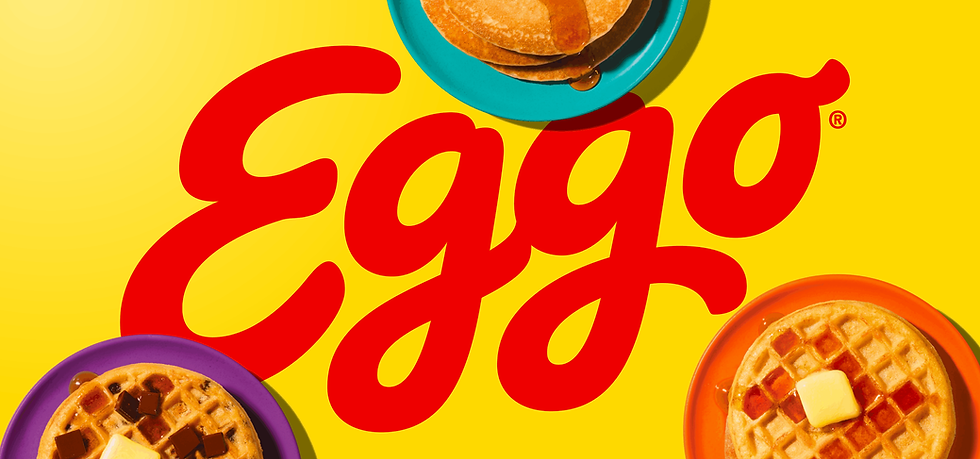 Large Eggo logo on a yellow background with pancake and waffle products on three plates.