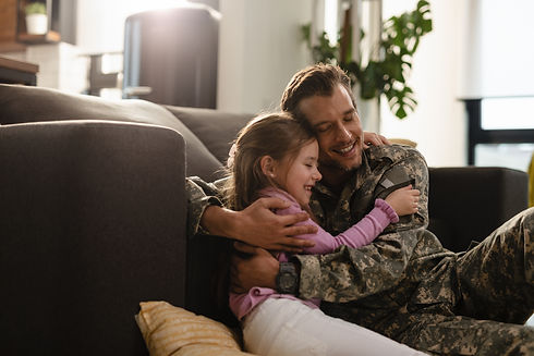 affectionate-military-father-his-daughter-embracing-with-eyes-closed-home.jpg