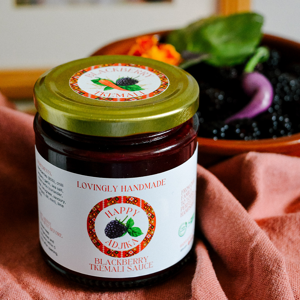 Tkemali with blackberries